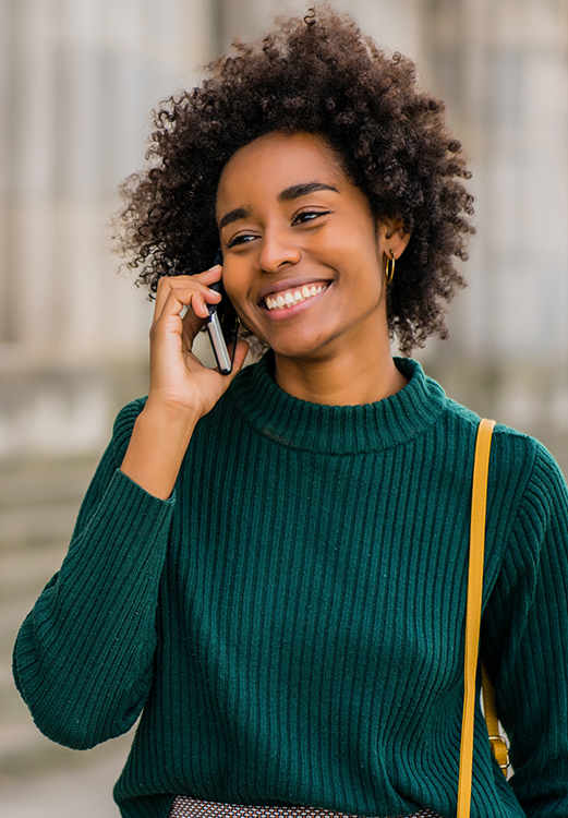 Person talking on the phone with a dental office in Madison